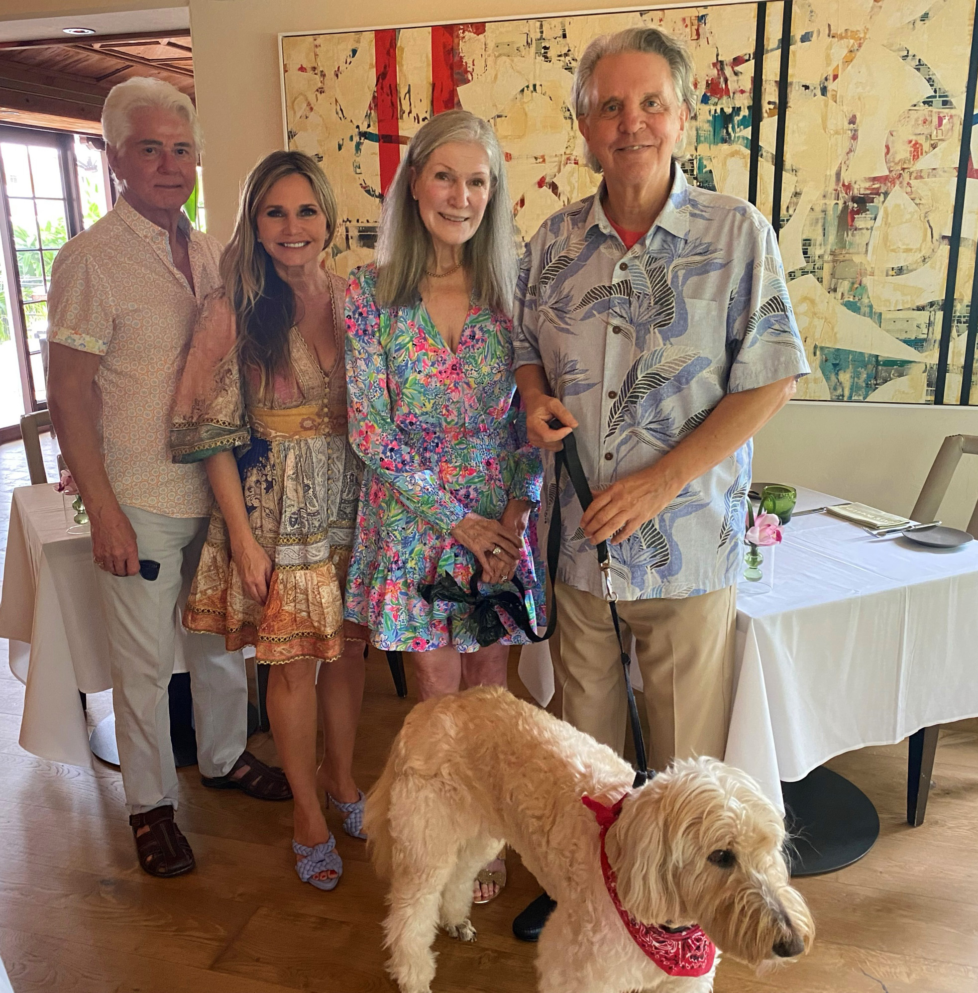 photo of Larry Strickland, American Humane's Robin Ganzert, Linda and Mike Curb with their dog Buddee